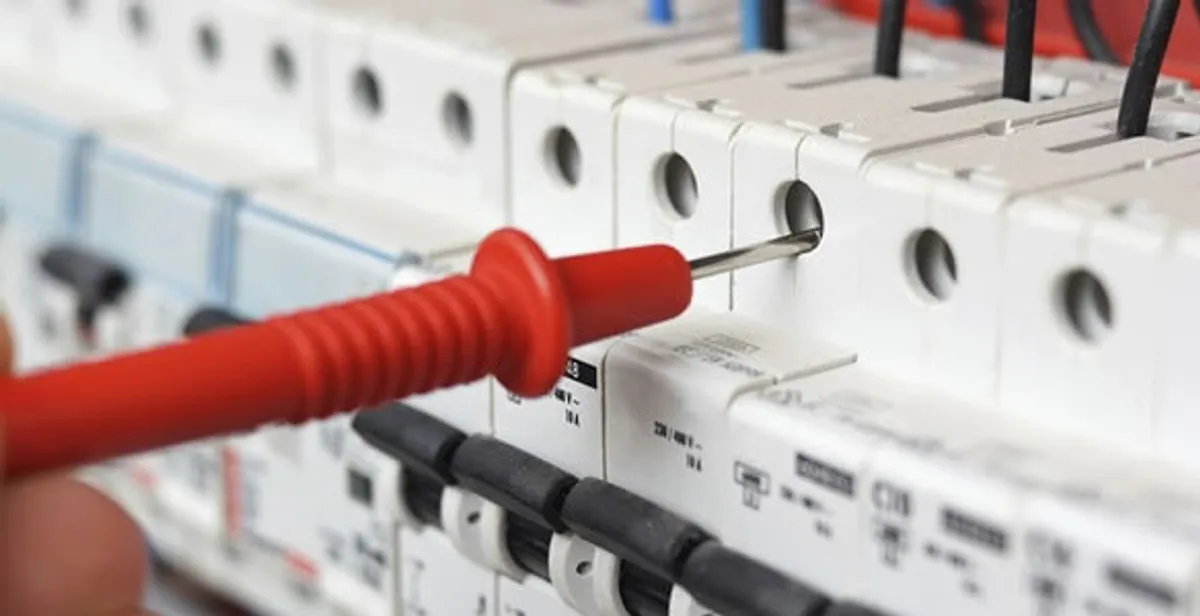 Electrical contractor testing circuit breakers during electrical repair in Sparks, NV